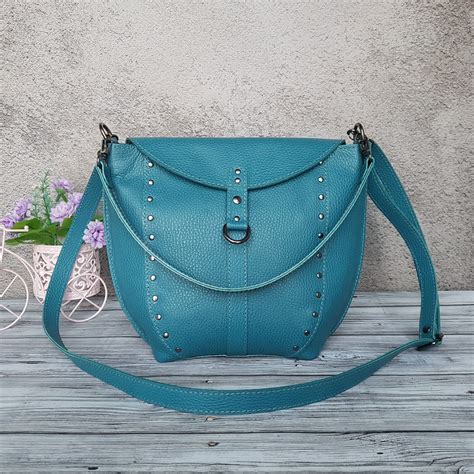 turquoise leather bag.